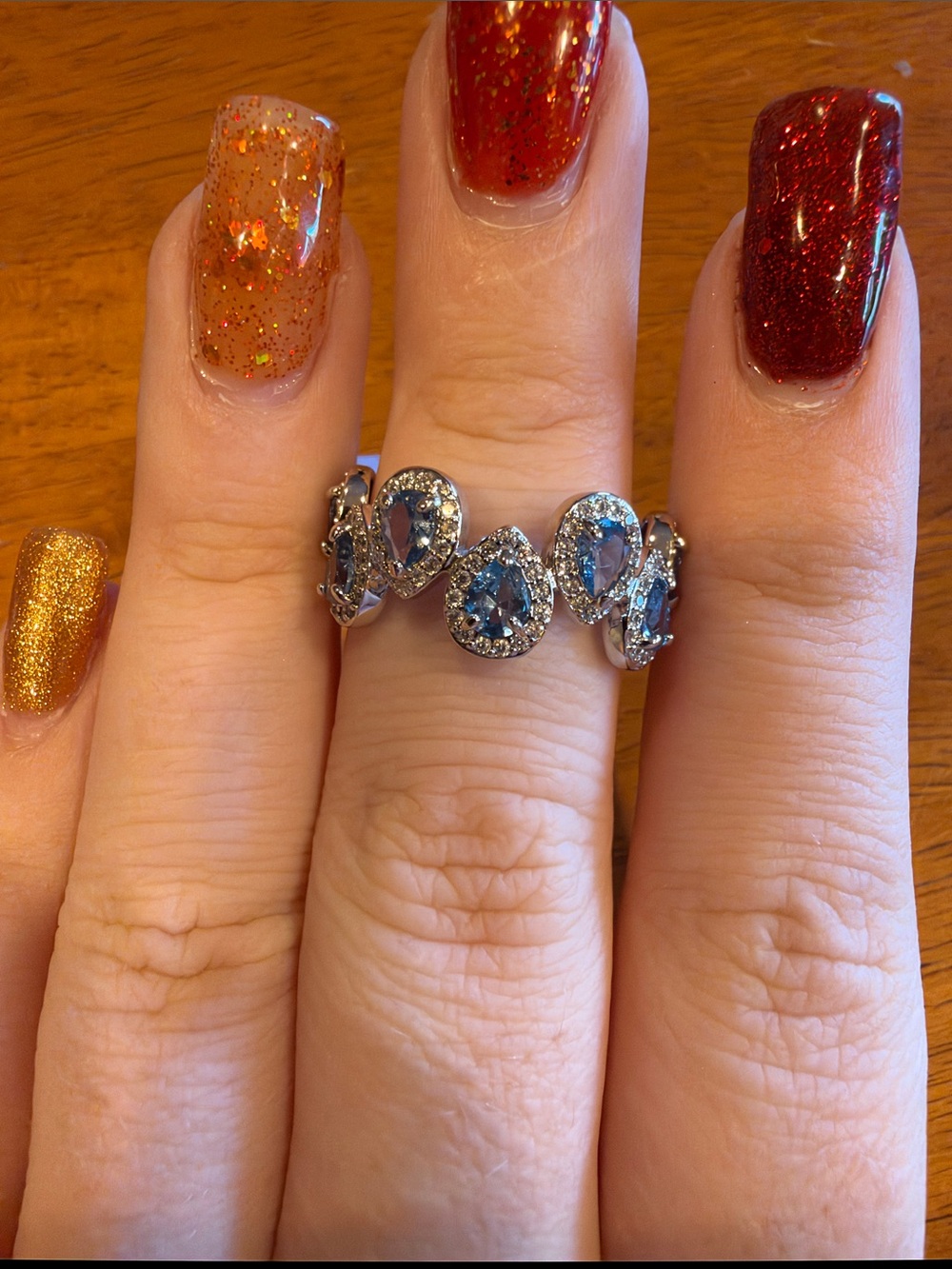 Sterling Silver Pear-Cut Blue Gem Halo Band